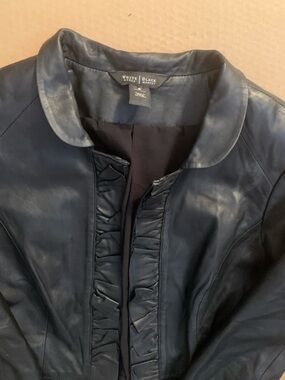 White House Black Market Black Leather Ruffle-Front Jacket.